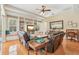 Comfortable living room with built-in bookshelves, hardwood floors, and a relaxing atmosphere at 13524 Glynshel Dr, Winter Garden, FL 34787