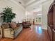 Inviting living room with hardwood floors, recessed lighting, and plenty of natural light at 13524 Glynshel Dr, Winter Garden, FL 34787