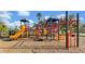 A vibrant playground offers children a fun area for activity, featuring slides, climbing structures, and play equipment at 13524 Glynshel Dr, Winter Garden, FL 34787