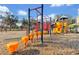 The community's colorful playground offers a safe and engaging space for children to play and explore at 13524 Glynshel Dr, Winter Garden, FL 34787