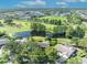 Stunning aerial view showcasing the property and its proximity to the golf course and community at 1387 Sawgrass Court, Winter Park, FL 32792