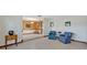 Comfortable living room with tiled floors, an accent wall, and elegant furnishings for a relaxing atmosphere at 1387 Sawgrass Court, Winter Park, FL 32792