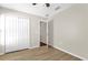 Bedroom featuring light walls, a large closet, and light wood flooring throughout at 14617 Keelford Way, Orlando, FL 32824