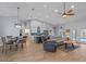 Spacious open floor plan featuring a kitchen, living area, and dining space at 14651 Pine Cone Trl, Clermont, FL 34711