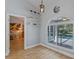 Bright sun room with large sliding glass doors offering pool views and natural light at 14651 Pine Cone Trl, Clermont, FL 34711