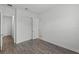 Bright bedroom with modern flooring and closet at 15161 Lake Bessie Loop, Winter Garden, FL 34787