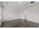 Bright and airy bedroom with recessed lighting and two doorways at 15161 Lake Bessie Loop, Winter Garden, FL 34787