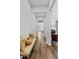 Inviting hallway adorned with elegant decor, leading to various areas of the home at 15698 Panther Lake Dr, Winter Garden, FL 34787