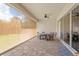 Large covered patio with an outdoor dining set and backyard view at 15698 Panther Lake Dr, Winter Garden, FL 34787