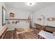 Spacious playroom area with wood flooring, storage, toys and learning accessories at 15698 Panther Lake Dr, Winter Garden, FL 34787