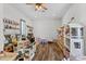 Expansive playroom perfect for , equipped with toys, dollhouses and play store at 15698 Panther Lake Dr, Winter Garden, FL 34787