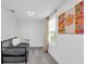 Comfortable bedroom featuring neutral walls, lots of natural light, and minimalist furnishings at 1615 Sanibel Dr, Davenport, FL 33896
