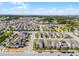 Aerial view of a residential neighborhood with well-manicured lawns and scenic views at 16484 Angel Fish Rd, Winter Garden, FL 34787