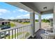 Relaxing balcony offers neighborhood views with comfortable seating at 16484 Angel Fish Rd, Winter Garden, FL 34787