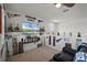 Bonus room with sports memorabilia, large TV, and room for entertaining at 16484 Angel Fish Rd, Winter Garden, FL 34787