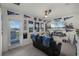 Spacious bonus room with sports decor and balcony access with neighborhood views at 16484 Angel Fish Rd, Winter Garden, FL 34787