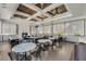 Elegant clubhouse featuring a cozy fireplace, stylish furniture, and ample seating for residents to relax and socialize at 16484 Angel Fish Rd, Winter Garden, FL 34787