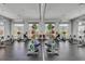 Bright fitness center with mirrored walls, offering exercise bikes and equipment for a complete workout at 16484 Angel Fish Rd, Winter Garden, FL 34787