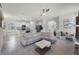 Spacious living room seamlessly connects to the kitchen, offering a perfect layout for entertaining at 16484 Angel Fish Rd, Winter Garden, FL 34787