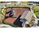 A lovely fenced playground with modern play structures and a shaded picnic area for Gathering fun at 16484 Angel Fish Rd, Winter Garden, FL 34787