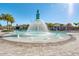 A playful splash fountain in the pool area provides interactive fun for families at 16484 Angel Fish Rd, Winter Garden, FL 34787
