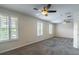 Second floor bedroom with multiple windows at 1676 Song Sparrow Ct, Sanford, FL 32773