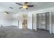 Large second floor bedroom with a walk in closet at 1676 Song Sparrow Ct, Sanford, FL 32773