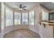 Bright breakfast nook with shuttered windows offers a sunny dining space at 1676 Song Sparrow Ct, Sanford, FL 32773