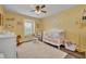 Adorable Bedroom room bathed in sunlight from the window at 2039 Beachberry Ln, Oviedo, FL 32765