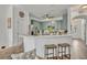 Well-lit kitchen with breakfast bar, featuring ample countertop space at 2039 Beachberry Ln, Oviedo, FL 32765