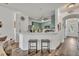 Stylish kitchen with breakfast bar, offering a perfect spot for casual dining and socializing at 2039 Beachberry Ln, Oviedo, FL 32765