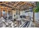 Backyard patio with comfortable seating and a grill, perfect for entertaining at 2039 Beachberry Ln, Oviedo, FL 32765