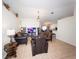 Spacious living room featuring tile floors and comfortable seating for relaxing and entertaining guests at 212 Ashford Dr, Davenport, FL 33837