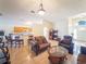 Bright and airy living room with tile floors, comfortable furniture, and an open layout at 212 Ashford Dr, Davenport, FL 33837