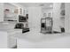 Bright white kitchen featuring updated countertops, fixtures, and stainless-steel appliances at 2330 Little Gem Loop, Sanford, FL 32773