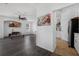 Inviting living area leading to a modern kitchen with stainless steel appliances at 2330 Little Gem Loop, Sanford, FL 32773