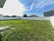 Fenced backyard provides ample space for outdoor enjoyment and recreation at 235 Hibiscus St, Winter Haven, FL 33881