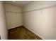A walk-in closet featuring neutral carpet and wire shelving at 235 Hibiscus St, Winter Haven, FL 33881