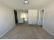 Hallway featuring carpet and neutral paint at 235 Hibiscus St, Winter Haven, FL 33881
