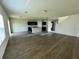 Open floor plan seamlessly connecting the living area, staircase and kitchen at 235 Hibiscus St, Winter Haven, FL 33881