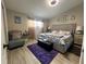 Cozy bedroom featuring plush bed, decorative accents, and soft lighting for a relaxing retreat at 2376 Flamingo Lakes Dr, Kissimmee, FL 34743