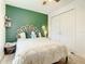 Bright bedroom features a large bed and ample closet space at 2545 El Portal Ave, Sanford, FL 32773