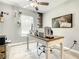 Light and airy office with modern desk, floating plant decor, and neutral color palette at 2545 El Portal Ave, Sanford, FL 32773