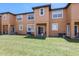 The property boasts a large backyard with lush green grass at 2706 Camaro Dr, Kissimmee, FL 34746