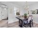 Elegant dining room featuring a chandelier and a dark wood table at 2706 Camaro Dr, Kissimmee, FL 34746
