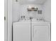 Functional laundry room with white washer and dryer units at 2706 Camaro Dr, Kissimmee, FL 34746