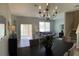 Open concept living space with dining area, comfortable seating, and lots of natural light at 2706 Camaro Dr, Kissimmee, FL 34746