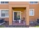 Cozy patio features seating, perfect for relaxing and enjoying the outdoor space at 2706 Camaro Dr, Kissimmee, FL 34746