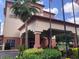 View of the Galleria Palms Hotel's entrance and driveway, showing a welcoming arrival area at 3000 Maingate Ln # 210, Kissimmee, FL 34747