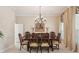 Formal dining room with elegant chandelier, and classic decor perfect for entertaining guests at 3201 Glenmere Way, Orlando, FL 32828